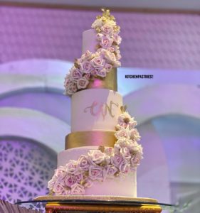 A wedding cake by Kitchen Pastries featured on the website we designed for them
